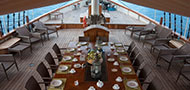Mutiara Laut Liveaboard - Open Deck Dining Table
